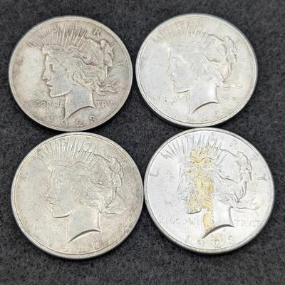 Four 1923 Peace Dollars