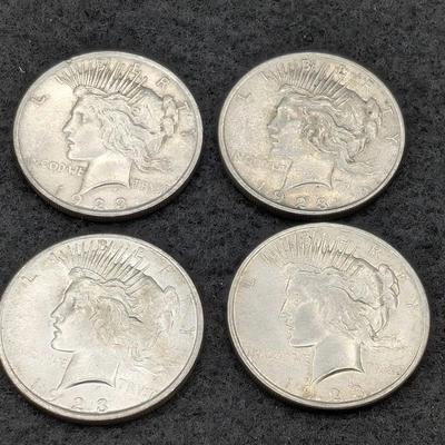 Four 1923 Peace Dollars