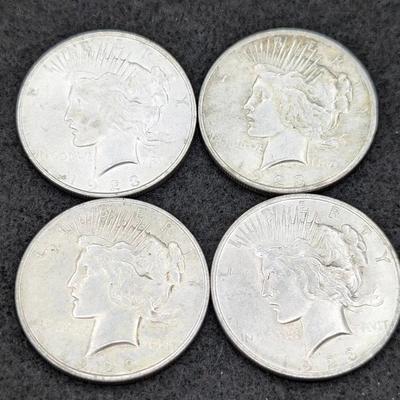 Four 1923 Peace Dollars