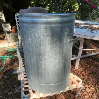 Galvanized Trashcan And Watering Can
