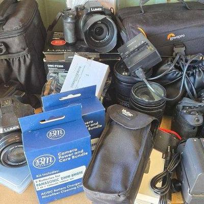 3014 • cameras, lenses & more