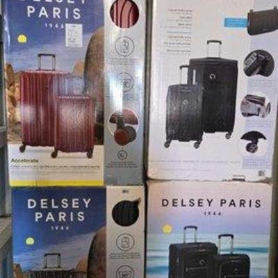 4504 • (4) delsey paris luggage sets