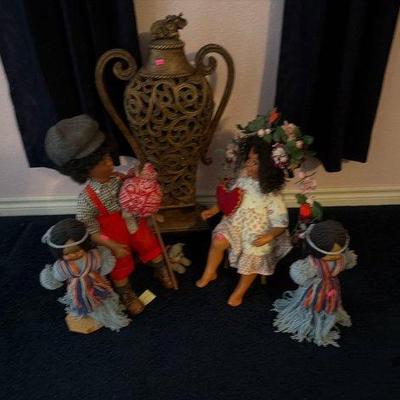 8197 • dolls and decorative elephant vase