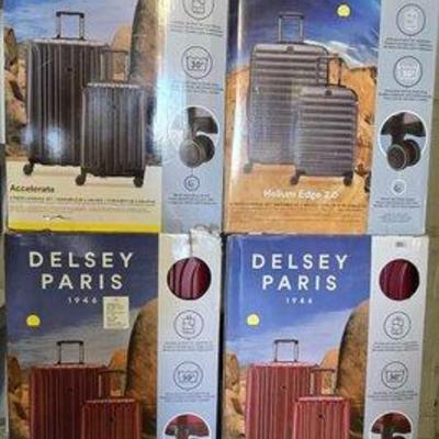4500 • (4) delsey paris luggage sets