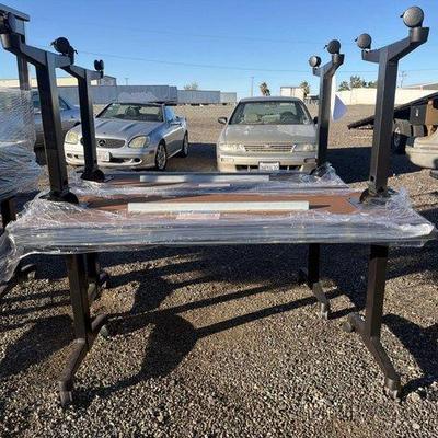 82032 • (4) herman miller rolling tables