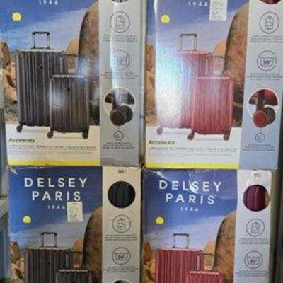 4502 • (4) delsey paris luggage sets