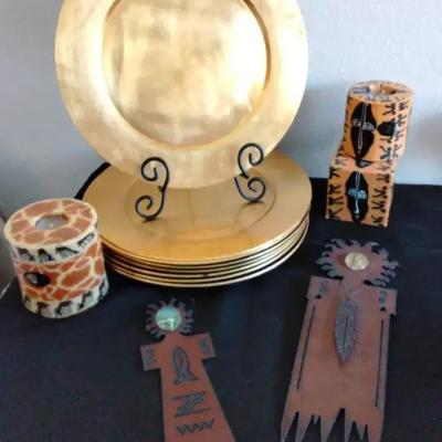 African Candle Holder, Gold Chargers and Southwestern Metal Objects.