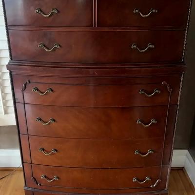 Vintage Six-Drawer Wooden Dresser with Decorative Accents
