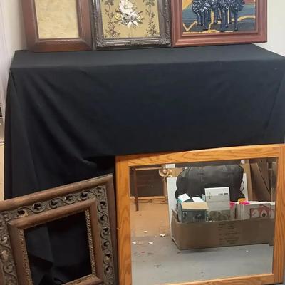 Artwork with Wooden Frames and Decorative Wall Pieces