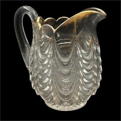 Sale Photo Thumbnail #45: Lot 063  
Heavy Drape Design Clear Glass Pitcher