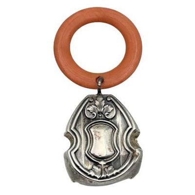 Sale Photo Thumbnail #56: Lot 077   
Sterling Silver Antique Teething Ring/Baby Rattle