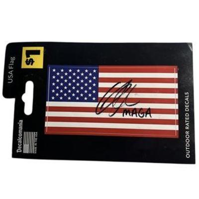 Lot 084   
Charlie Kirk Signed USA Flag Decal