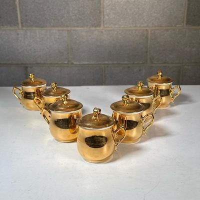 (7pc) Royal Worcester Gilt Porcelain Demitasse Cups | Gold/copper colored small cups / lidded vessels with curved handles; can also be...