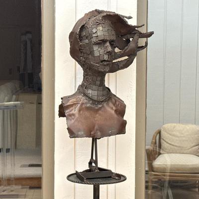 Bronze Sculpture | Woman in the Wind | Mounted on a scrolled pedestal; sculpture h. 28.5 in. Dimensions: h. 68.5 in (overall on stand)
