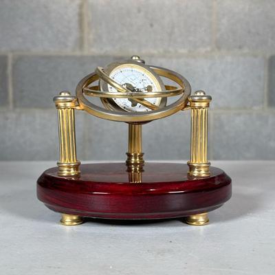 Chass Armillary Gyroscopic Desk Clock | intage armillary-style clock having a rotating globe-form clock suspended within intersecting...