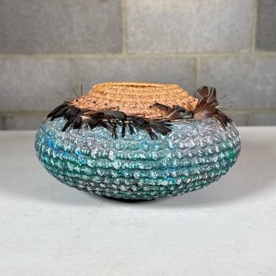 Woven Basket with Feathers | With blue paint / decoration, woven with feathers and small seeds or beeds Dimensions: h. 4.25 x dia. 7.5 in
