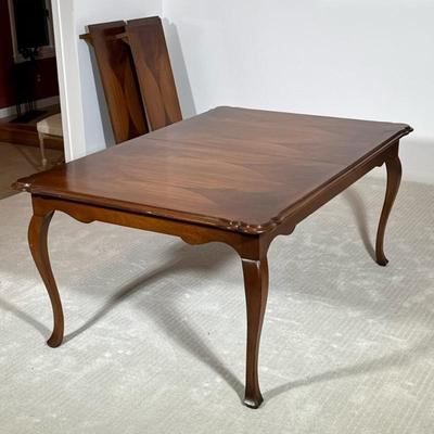 Provincial-Style Dining Table | With stylistic inlaid top with shaped corners over cabriole legs, with three leaves (each w. 15.25 in.)...