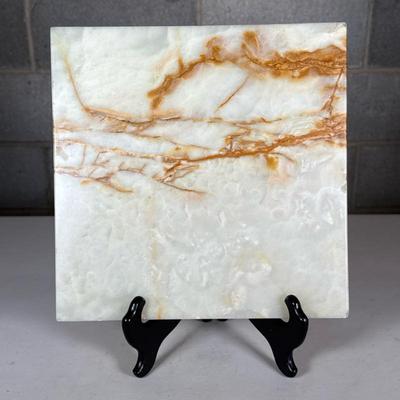 10-inch Onyx Trivet | Stone, likely onyx, trivet or display block Dimensions: h. 0.75 x w. 10 x l. 10 in

