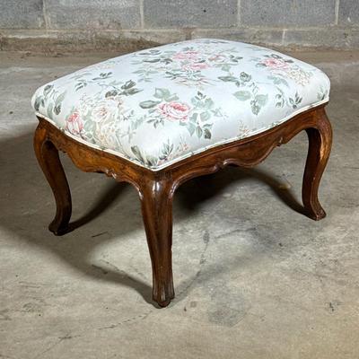 ANTIQUE QUEEN ANN WALNUT FOOTSTOOL | With floral patterned cushioned upholstery, over cabriole legs Dimensions: h. 18 x l. 26 x d. 20 in
