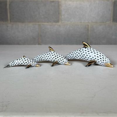 (3pc) Herend Fishnet Porcelain Dolphin Figurines | Three dolphins of graduated size in black fishnet and with gilt highlights, marked on...