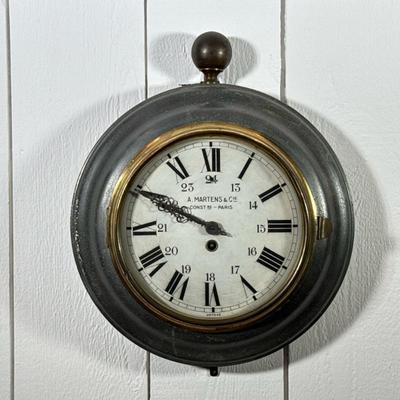 A. MARTENS & Cie. FRENCH PARCEL GILT TOLE WALL CLOCK | Whimsical, in the form of a pocket watch, with Roman numeral markers...