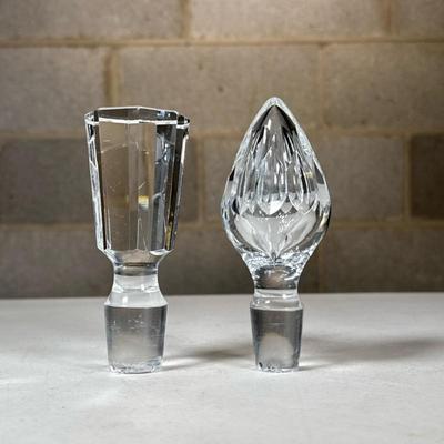 (2pc) Crystal Decanter Stoppers | Including a stopper with eight flat sides and possibly a Baccarat stopper of the Armagnac pattern....