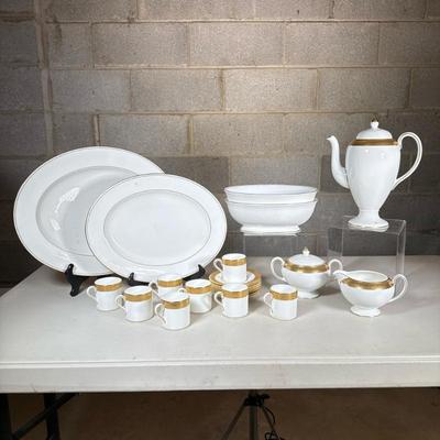 (23pc) Wedgewood “Ascot” Bone China Demitasse Set | Gold trim borders on cream colored china. Including Coffee pot and top, sugar and...
