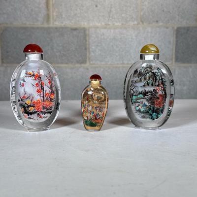 (3pc) Chinese Reverse Painted Glass Snuff Bottles | Smallest h. 3-1/8 in. Dimensions: h. 4.75 x w. 2.75 in (larger two)
