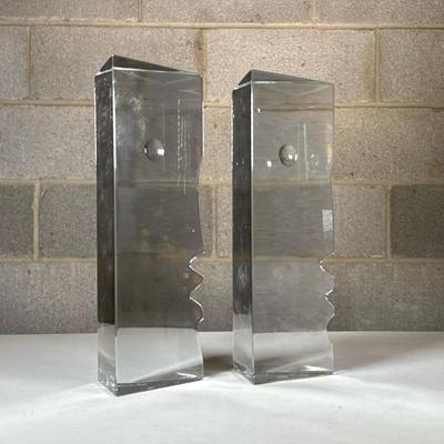 (2pc) Baccarat Crystal Face à Face Bookends | heavy, sculptural Baccarat crystal bookends, each formed as an abstracted opposing profile...