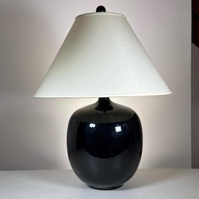 Mid-Century Black Ceramic Table Lamp | With a painted wood finial Dimensions: h. 26.5 x dia. 10 in (excl. shade)
