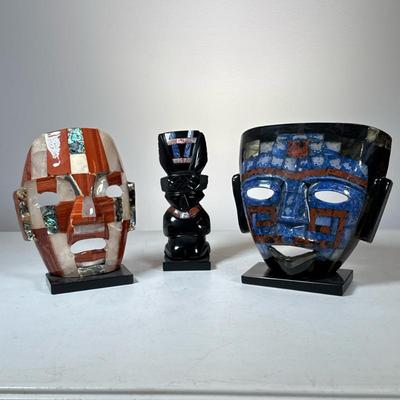(3pc) Mixed Stone Inlay & Wood Masks / Figurine | Including a carved black stone, possibly onyx, figure with inset lapis and other...