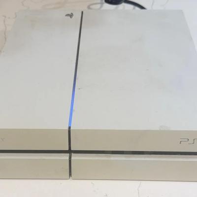 Play Station 4 (PS4) + Two Controllers