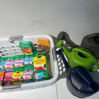 Lot Of Flower Seeds, Plant Food And Watering Cans