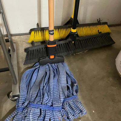 Two Push Brooms And A Mop