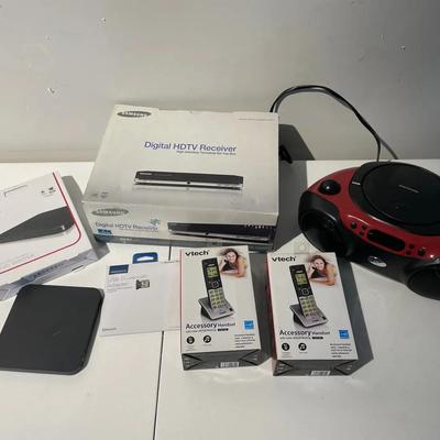 Miscellaneous Household Electronics Including A Small Radio