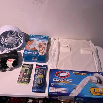 Various Household Items Including A Hanging Storage Cubby Organizer