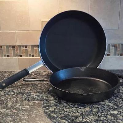 (1) Lodge Cast Iron Skillet and (1) Non-Stick Saute Pan