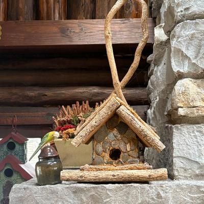 A collection of fun folk art bird houses