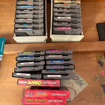 Vintage Nintendo NES game cartridges including Super Mario Bros