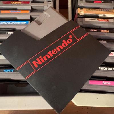 Vintage Nintendo NES game cartridges including Super Mario Bros