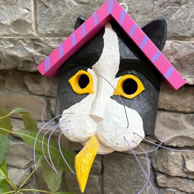 A collection of fun folk art bird houses