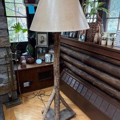 A pair of oak branch floor lamps, perfect for your lake house