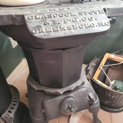 Sale Photo Thumbnail #52: Antique cast-iron stove