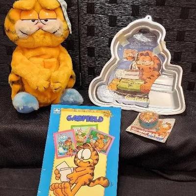 Garfield Zipper Plush, Cake Mold,  YoYo, & Sticker Book