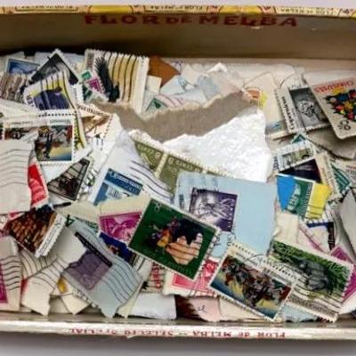 Collectible Stamps In Vintage Flor De Melba Cigar Box