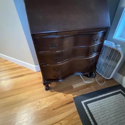 Curved dresser with desk top