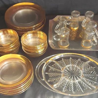 GOLD-TONED GLASS PLATES AND BOWLS FOR 10 AND MORE