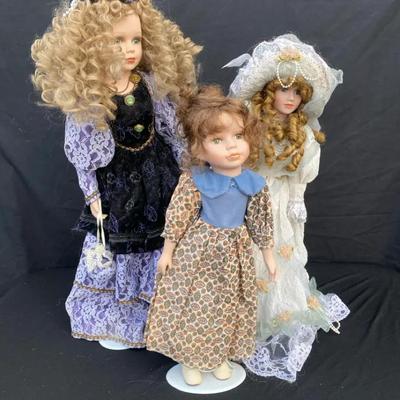 Three Porcelain Dolls