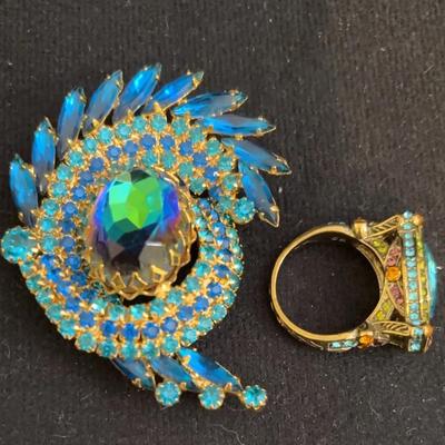 Proud As A Peacock In Blue And Green. 