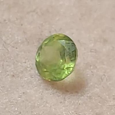 Natural Green Peridot Loose Gemstone – Round Cut, ~0.6 ct
